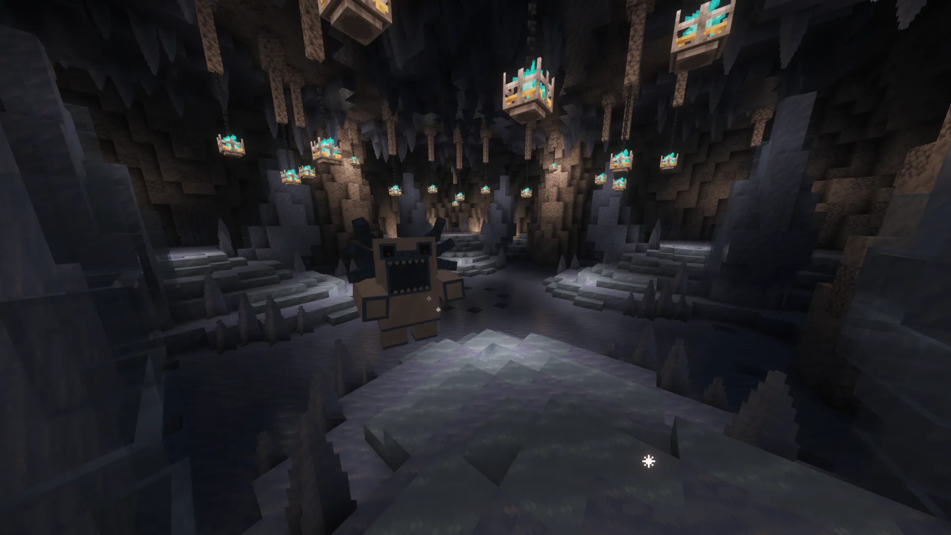 A Vault chamber of pale rock hung with lanterns, with a large brown yeti mob roaring at the player